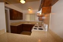 This photo is the visual representation of gourmet kitchens  at Fullerton Townhouse Apartments.